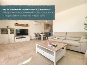 TV a/nebo společenská místnost v ubytování Salinea Apartments