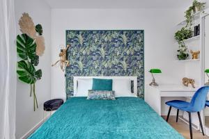 Posteľ alebo postele v izbe v ubytovaní Anchor Apartments JUNGLA