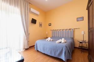 Posteľ alebo postele v izbe v ubytovaní Medina H. Napoli Centro, by ClaPa Group