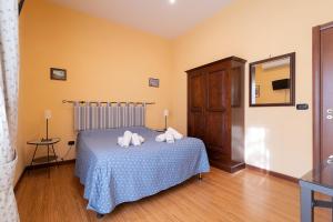 Posteľ alebo postele v izbe v ubytovaní Medina H. Napoli Centro, by ClaPa Group