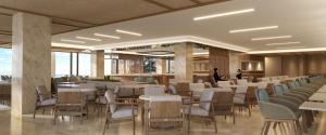 a rendering of a restaurant with tables and chairs at Ammoa Luxury Hotel & Spa Resort in Nikiti