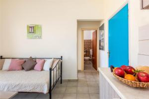 A bed or beds in a room at Litsas Studios