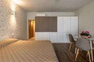 Postel nebo postele na pokoji v ubytování Dimora Montagnoli