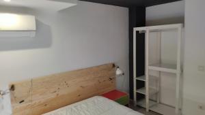 Ein Bett oder Betten in einem Zimmer der Unterkunft valencialoft