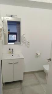 Ein Badezimmer in der Unterkunft valencialoft
