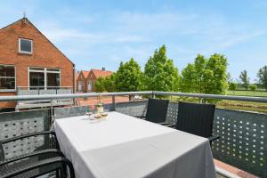 Balkón nebo terasa v ubytování Ribe Byferie Resort