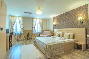 Ένα ή περισσότερα κρεβάτια σε δωμάτιο στο Hotel Anhea
