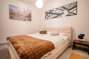 Katil atau katil-katil dalam bilik di MAGICO Rooms & Apartments