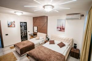 Katil atau katil-katil dalam bilik di MAGICO Rooms & Apartments