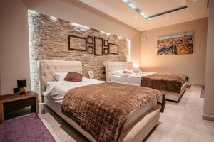 Katil atau katil-katil dalam bilik di MAGICO Rooms & Apartments
