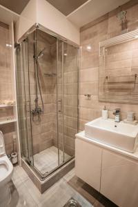 Bilik mandi di MAGICO Rooms & Apartments