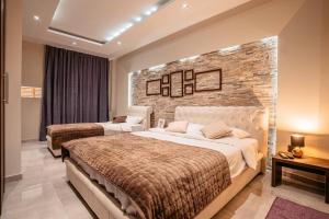 Katil atau katil-katil dalam bilik di MAGICO Rooms & Apartments +31 gambar