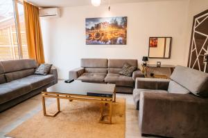 Ruang duduk di MAGICO Rooms & Apartments