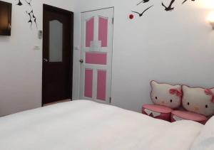 Letto o letti in una camera di Wushih Surf Hostel