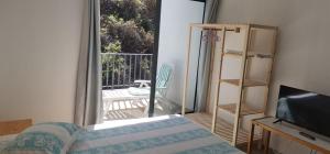 מיטה או מיטות בחדר ב-Luz d'Sol - Residencial Familiar
