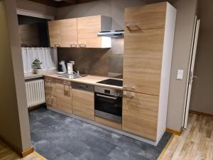 Kuchyň nebo kuchyňský kout v ubytování Ferienwohnung Lilith