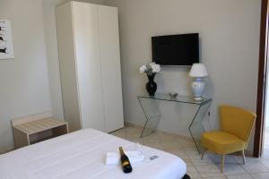 Afbeelding uit fotogalerij van Colonna Rooms & apartment in Trani