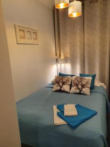 Posteľ alebo postele v izbe v ubytovaní Charming apartment in the Old Town