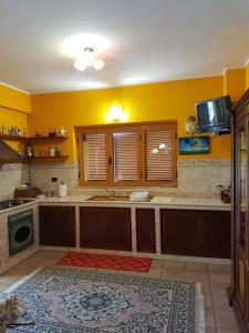 Küche/Küchenzeile in der Unterkunft A casa di Maria