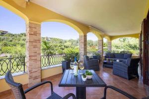 Posedenie v ubytovaní Alghero Villa Mistral per 7 persone Terrazza BBQ AC WiFi