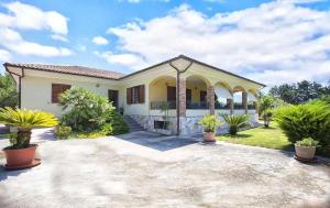 Vonkajšia záhrada v ubytovaní Alghero Villa Mistral per 7 persone Terrazza BBQ AC WiFi