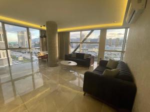 A seating area at Le Luxe Suites Hotel & Spa