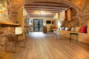 Ein Sitzbereich in der Unterkunft Priorat Aparthotel