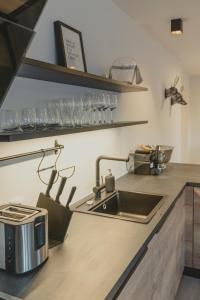 Kuchyň nebo kuchyňský kout v ubytování Bergkranz Apartments