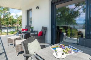 Χώρος καθιστικού στο Appartement "Traumzeit" mit Penthouseflair - Oase am Haff