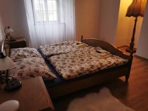 Postel nebo postele na pokoji v ubytování Apartmány Sedmikráska Vříšť