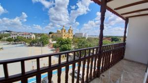 a balcony with a view of a city at Perla De La Sabana in Corozal