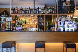 Nápoje v ubytovaní Hotel Garni Pegrà