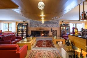 Nápoje v ubytovaní Hotel Garni Pegrà