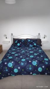 Postel nebo postele na pokoji v ubytování Casa Delfín