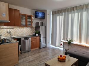 Kuchyň nebo kuchyňský kout v ubytování aPARTment chLEEW (1844) + 3 fotografie