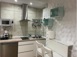 Η κουζίνα ή μικρή κουζίνα στο Loft Ben A Ocaz +10 φωτογραφίες