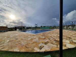 a swimming pool in the middle of a courtyard at Bedroom Airport in Maceió +12 photos