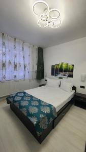 Ένα ή περισσότερα κρεβάτια σε δωμάτιο στο Apartament Fodor