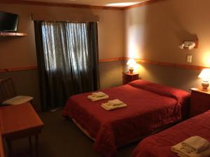 Cama ou camas em um quarto em Hotel Koi Mahik