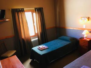 Cama ou camas em um quarto em Hotel Koi Mahik