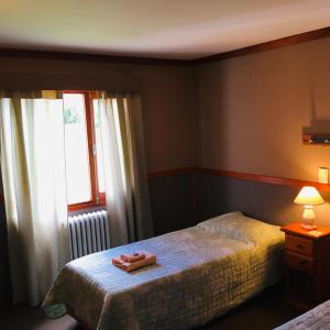 Cama ou camas em um quarto em Hotel Koi Mahik