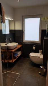 Koupelna v ubytování Stadtnahe Wohnung mit Garten und Parkplatz