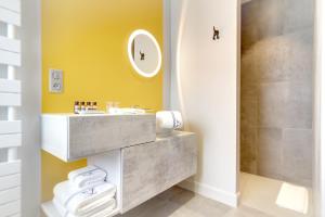 a bathroom with a sink and a shower at Le Florida Auberge contemporaine in Castéra-Verduzan +67 photos