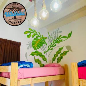 Postel nebo postele na pokoji v ubytování Waikiki Hostel