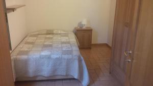 Ένα ή περισσότερα κρεβάτια σε δωμάτιο στο Residenza San Martino