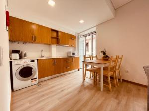Η κουζίνα ή μικρή κουζίνα στο Living Funchal X