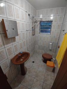 Kylpyhuone majoituspaikassa Casa Praia Itanhaém