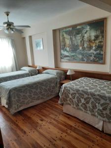 Postel nebo postele na pokoji v ubytování LOWCOST MADRYN