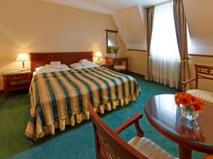 Letto o letti in una camera di Hotel Stefanik