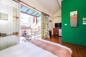 Cama ou camas em um quarto em Ying Hsuan House